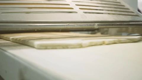 The machine for rolling the dough Stock Footage 85600999