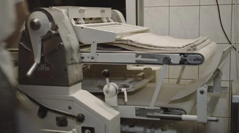 A Machine rolls Bread Stock Footage 66438440
