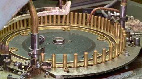 Machine rotates bullet capsule Stock Footage 103846764