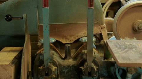 Machine is sanding the clogs from a wooden block Stock Footage 47002015