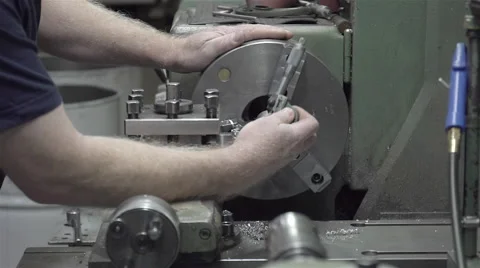 Machine shop worker slo mo Stock Footage 45416659