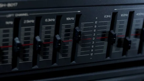 A machine with slider knobs and frequencies. Late 1900s technology concept. 動画素材 109099709