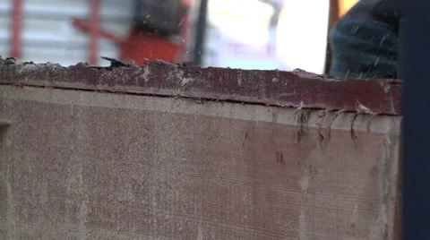 Machine for slitting cuts lumber and handles a large board on the sawmill Stock Footage 62012016