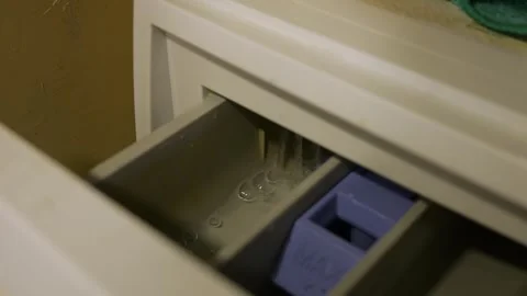 Machine Soap Buildup. Foam And Residue Indicate Possible Detergent Dispenser Stock Footage 330396098