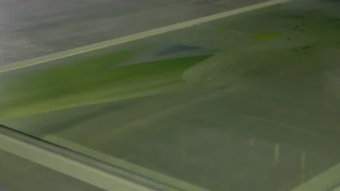 A machine with software control, puts the paint on the glass. Factory for the Video stock 85057229