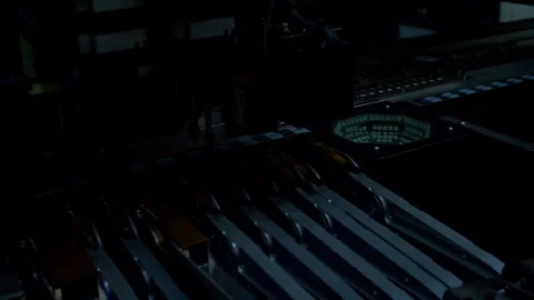 Machine sorting and assembling components for an electronic device Stock Footage 337071883