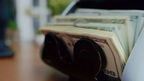 Machine Sorts And Counts Hundred Dollar Bills For Professional Audit Control Stock Footage 315351801