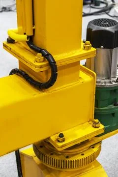 The machine support base is made of large steel legs with a hydraulic jack .. Stock Photos
