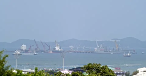 Machine takes sand from the bottom of the river and loads it onto a barge. Stock Footage 248249008
