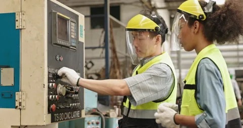 Machine technicians in a factory are checking electrical equipment and machines  Stock Footage 230631928