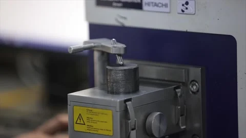 The machine is testing hardness of metal sample in lab   스톡 동영상 305996340