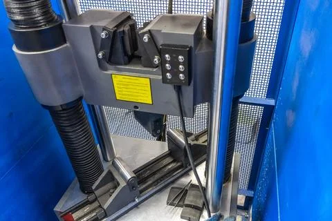 Machine for testing metals for strength and deformation in laboratory at Stock Photos