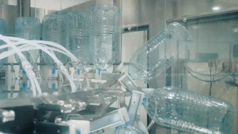Machine tool turns up large empty bottles in plant workshop Stock-Footage 162095468