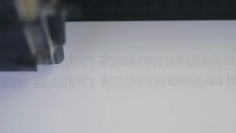 Machine tool writes inscription to embroid slogan on fabric Video stock 142800591