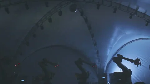 Machine Tools With Droid Masks Programmed For Synchrone Movements Stock Footage 100379908