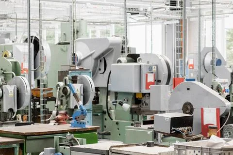 Machine tools installed to process material at plant Stock Photos