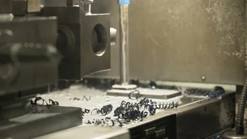 Machine tools for metal working. A metal workpiece is machined by an electric Stock Footage 130853916