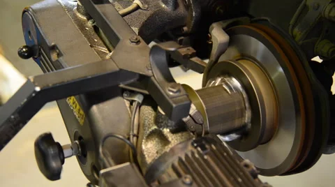 Machine turning car brake, Auto machine grinding the brakes car. Stock Footage 47726293