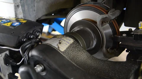 Machine turning car brake, Auto machine grinding the brakes car. Stock Footage 47727198