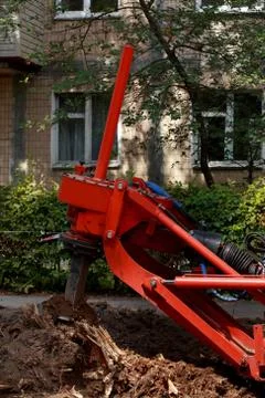 Machine for uprooting stumps Stock Photos