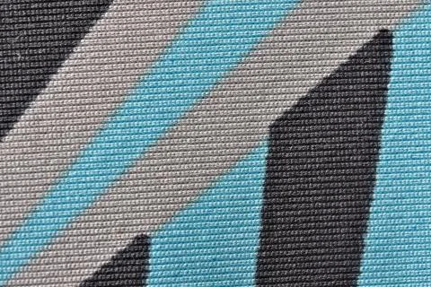 Machine wool knitted fabric close-up Stock Photos