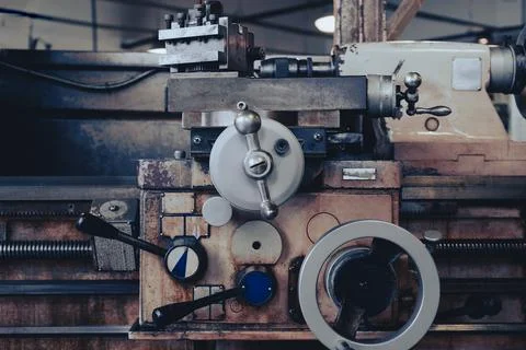 Machine work shop with grinder machine and bench Vise Stock Photos