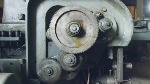 Machine working by rotating gear transmission Stock Footage 204055300