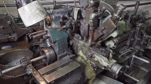 The machine in the workshop cuts a piece of steel wire on the go. Stock Footage 117223697