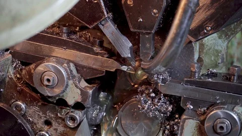 The machine in the workshop cuts a piece of steel wire on the go. Stock Footage 117224062