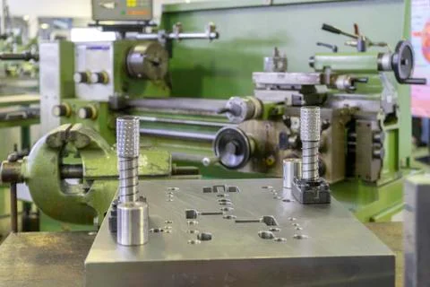 Machine workshop with lathe machine and bench vise Stock Photos