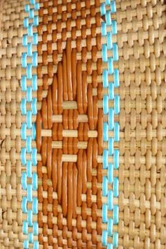 Machine woven wicker with a beautiful pattern. Stock Photos