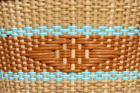 Machine woven wicker with a beautiful pattern. Stock Photos