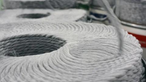 Machinery and equipment in the workshop. Interior of industrial textile factory. Stock Footage 99305718