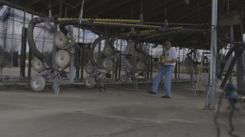 Machinery for Batting Cage at Work Stock Footage 141089252