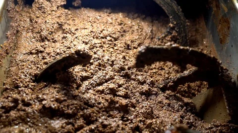 Machinery mixing olive paste in an olive-press to make olive oil. Stock Footage 91859817