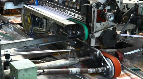 Machinery for sorting and cellophane magazines Stock Footage 67375129