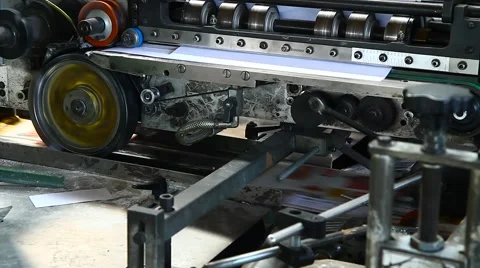 Machinery for sorting and cellophane magazines Stock Footage 67375326