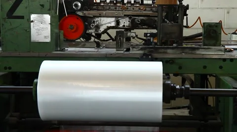 Machinery for sorting and cellophane magazines Stock Footage 67376167