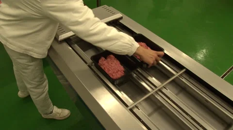 MACHINES packed minced meat in a box Stock Footage 52872857