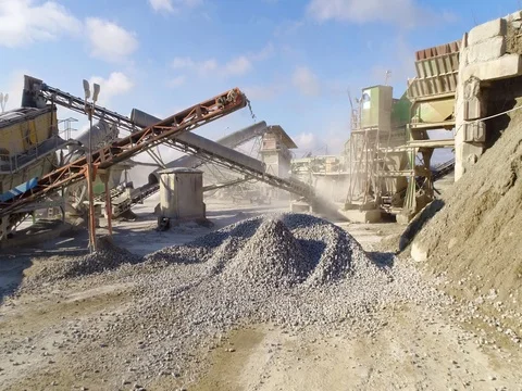 Machines work on a huge quarry for the extraction of stone Stock Footage 73198111
