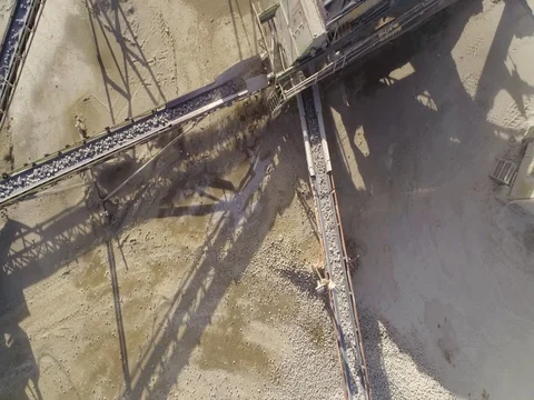 Machines work on a huge quarry for the extraction of stone Stock Footage 73200562