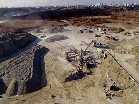 Machines work on a huge quarry for the extraction of stone Stock Footage 73226817