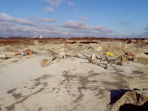 Machines work on a huge quarry for the extraction of stone Stock Footage 73227761