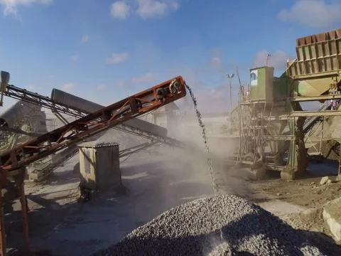 Machines work on a huge quarry for the extraction of stone Vídeo Stock 73228469