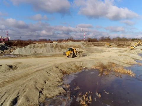 Machines work on a huge quarry for the extraction of stone Stock Footage 73229296