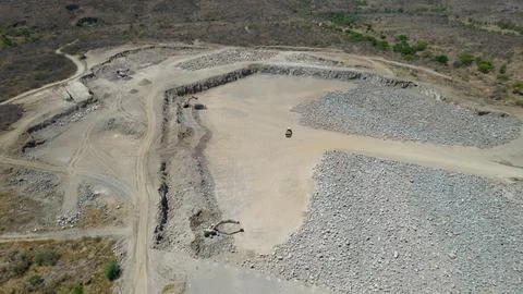 Machines working in cement quarry Stock Photos