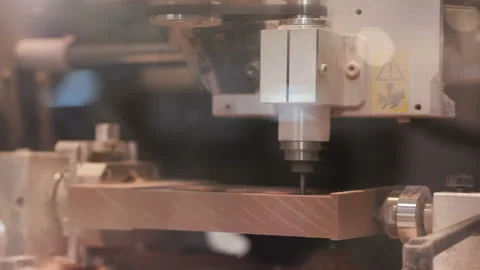 Machining and cutting of plastic product close up. Computer control of high tech Stock Footage 199475138