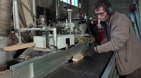 Machining a pine board to the moulder Stock Footage 56393934
