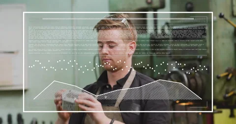 Machinist inspecting metal component in tech workshop, showing animated code Stock Footage 309110703