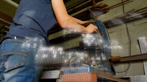 Machinist rotating wheel, aligning bar, lowering saw for cutting in metal shop Stock Footage 331701123